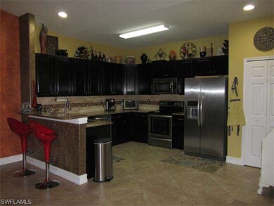 Open kitchen with Granite & Stainless