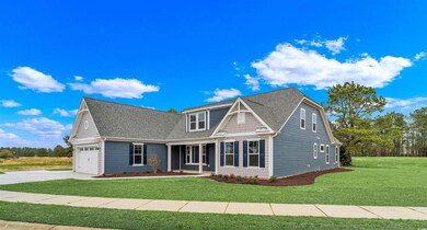 View of front of home featuring a front lawn and a