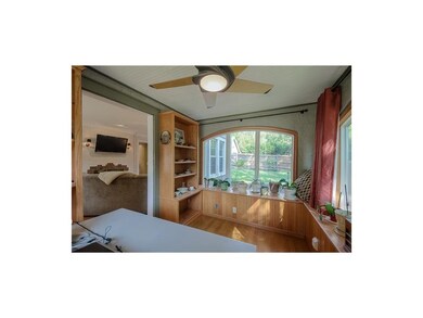 Another view of the enclosed porch, looking toward