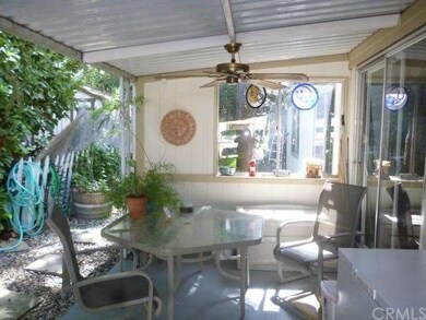 Covered front patio showing sliding glass doors in