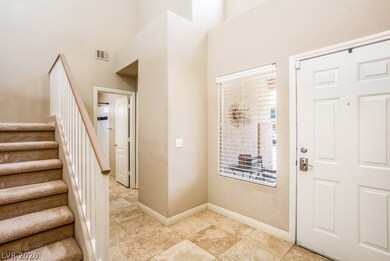 Open foyer with high ceiling.