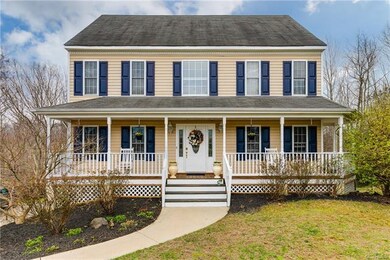 Charming, full front porch...Just bring your rocki