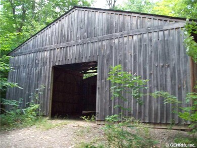 Exterior Front. Back of Horse Barn, for more stora