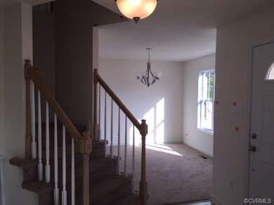 Open 2 Story Foyer with view to Dining Room
