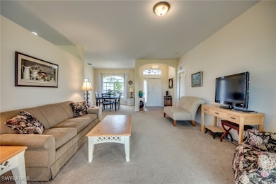 main living room, dining and living in back