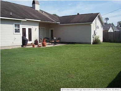 View of large backyard and patio area. Perfect for