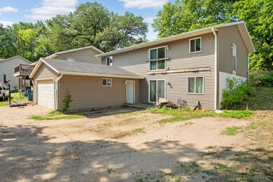 Alley entrance with a huge attached garage.  Add a deck for instant equity!
