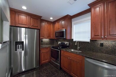 1 Villa D'Est Dr unit D-04, Coram, NY 11727 - photo 2