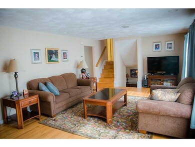 Living Room. Hardwoods and a wall of windows!