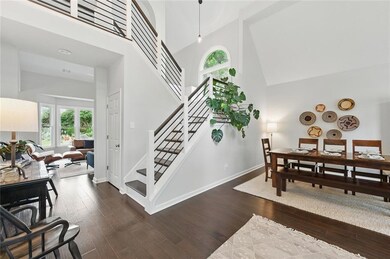 Entry/Foyer Looking into Formal Dining Room and Staircase with Updated Banisters and Horizontal Spindles