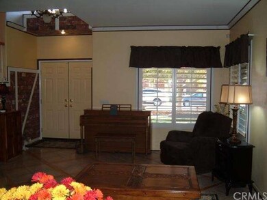 Distinctive entry, plantation shutters, tile floor