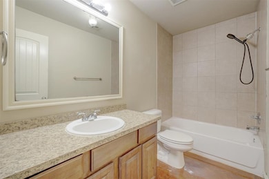 Full bath featuring vanity and tub / shower combination