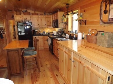 Kitchen with dining island.