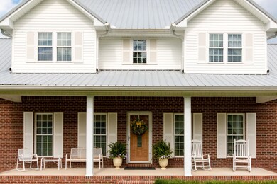 Relax the day away on this great front porch!