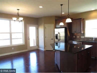Informal dining room is spacious and has large win