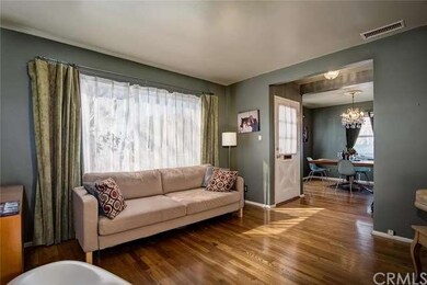 The Formal Living Room Entrance Is Bright And Open