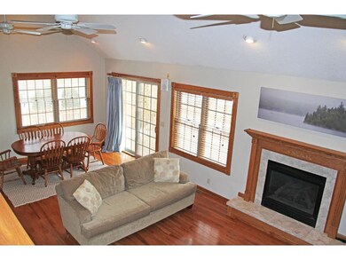 View from the stairway landing.   Open floor plan 