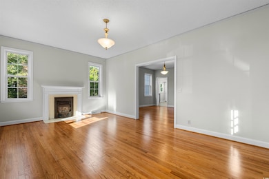 Unfurnished living room with a textured ceiling an