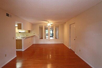 Living room with engineered hard wood flooring.  T