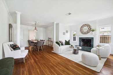 Formal living open to the dining room.