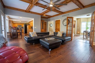 main living room view to kitchen from fireplace wa