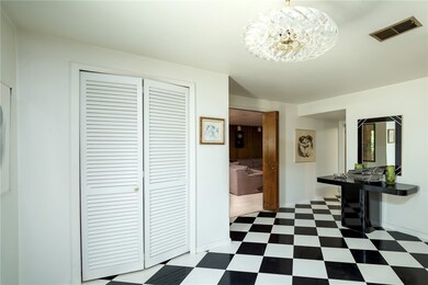 12' x 11' foyer entry provides same level access to the family room, powder room, & laundry room