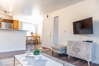 Living/Family room facing the kitchen and dining a
