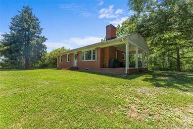 Side porch off Kitchen for outside enjoyment & din