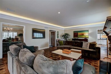 Family room with fireplace and views of the backya