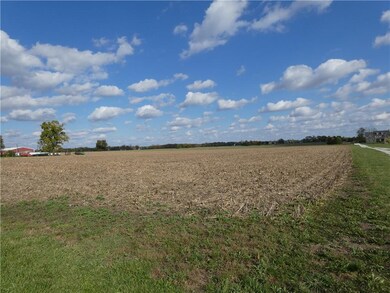 It runs back 652' (basically just before the house on the right)