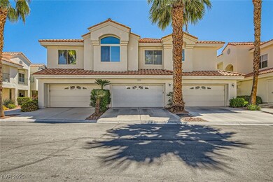 Townhome / multi-family property with driveway, st