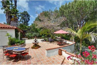 Private Entry Courtyard with lush landscaping and 