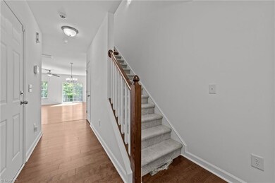 Plastic you see at the bottom of the stairs is protecting the carpet throughout the upstairs.