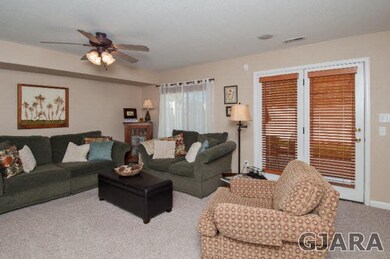 Living room with french doors to the back yard