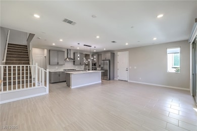 Kitchen with appliances with stainless steel finis