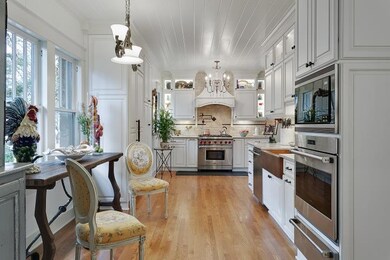 Recently renovated kitchen. Beadboard ceiling, wolfe, subzero, bosch appliances. Copper farm sink.