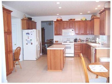 Kitchen. Large kitchen, many oak cabinets, island,