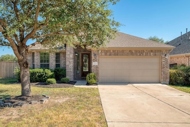 View of front of house featuring brick siding, dr