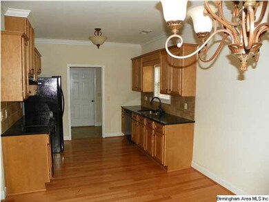 Granite and hardwood in kitchen