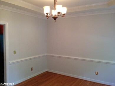 Dining Room - Dining Room with Tray Ceilings.