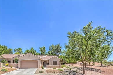 Mediterranean / spanish-style house with driveway,