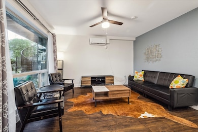 The open living area flows organically from the ki