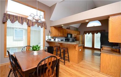 Dining room overlooking family room with counterto