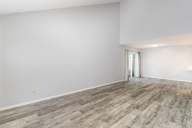 View of patio door (off of dining area) from the front door