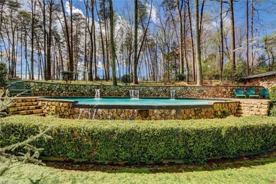 The backyard oasis is privately nestled in the ban