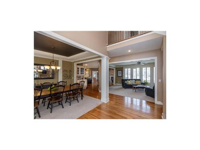 Gleaming hardwoods throughout front entry, kitchen