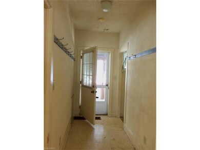 Entry way off enclosed side enclosed porch.
