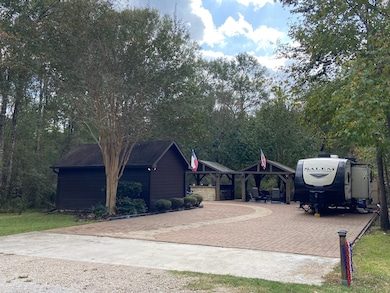 Beautiful Patio Pavers make up this driveway, parking and patio areas.