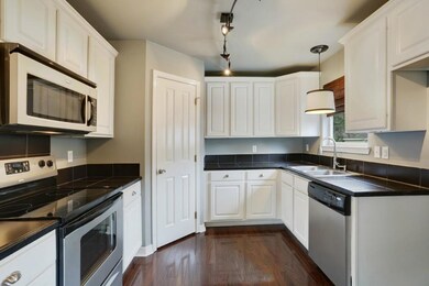 KITCHEN- The kitchen has a very clean modern, and
