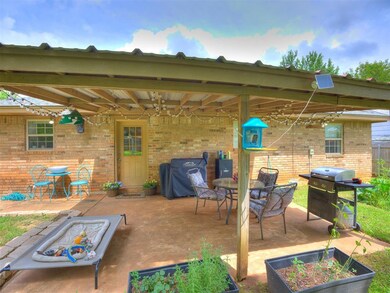 View of patio / terrace featuring area for grilling and a vegetable garden